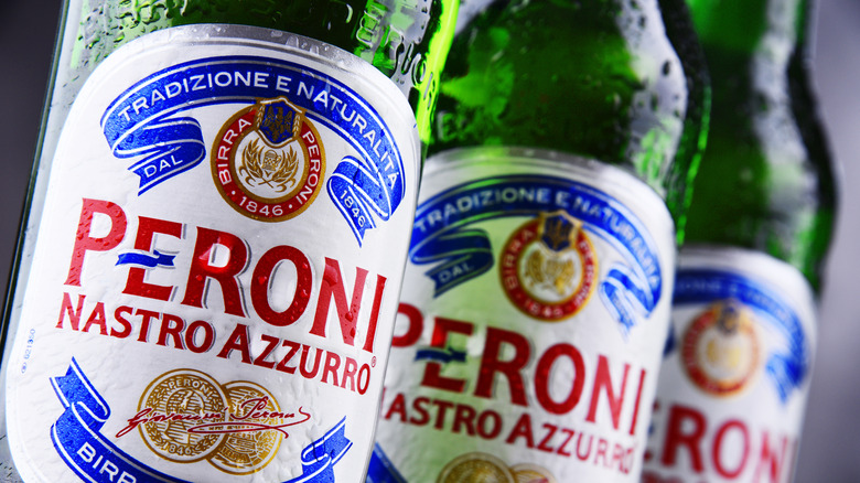 Bottles of Peroni beer with condensation 