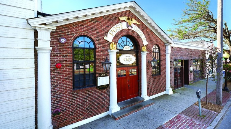 The brick exterior of the Post Office Cafe in Babylon, New York.