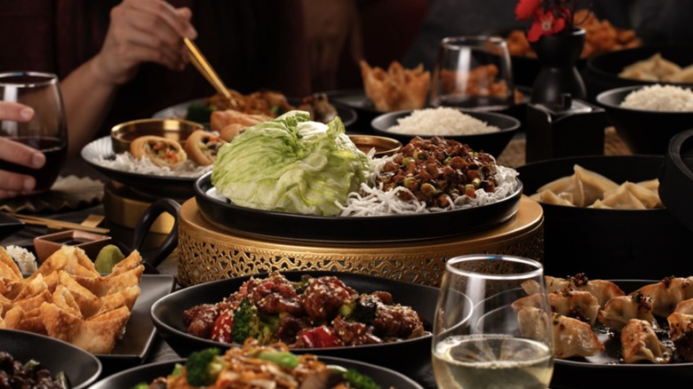 Table full of P.F. Chang's appetizers