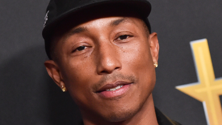 pharrell williams attending music event