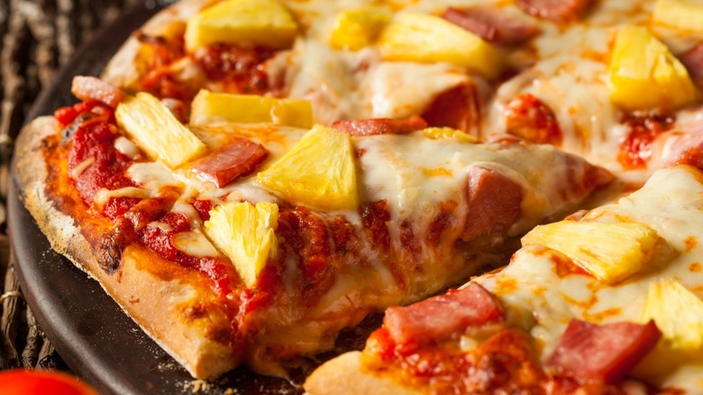 close up of pineapple pizza pie