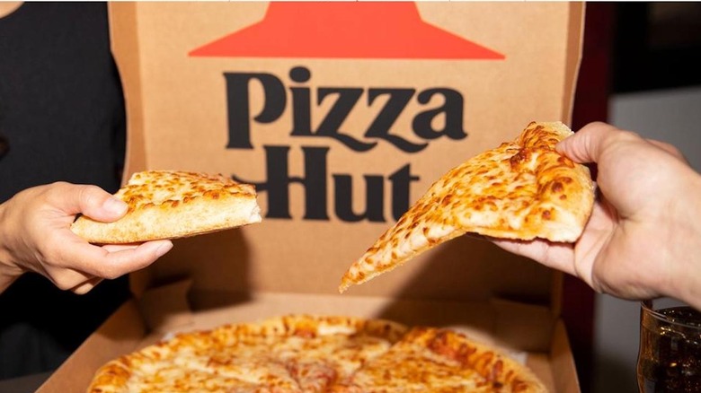 Pizza Hut box and pizza slices