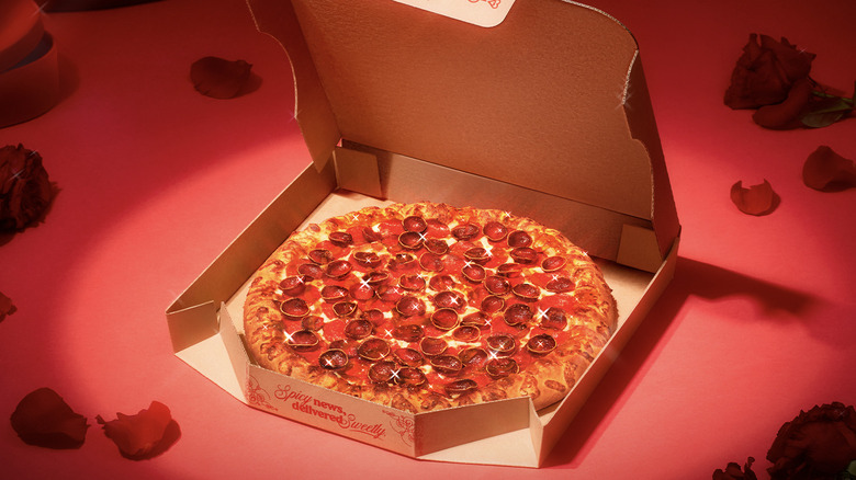 Open box of pepperoni pizza 