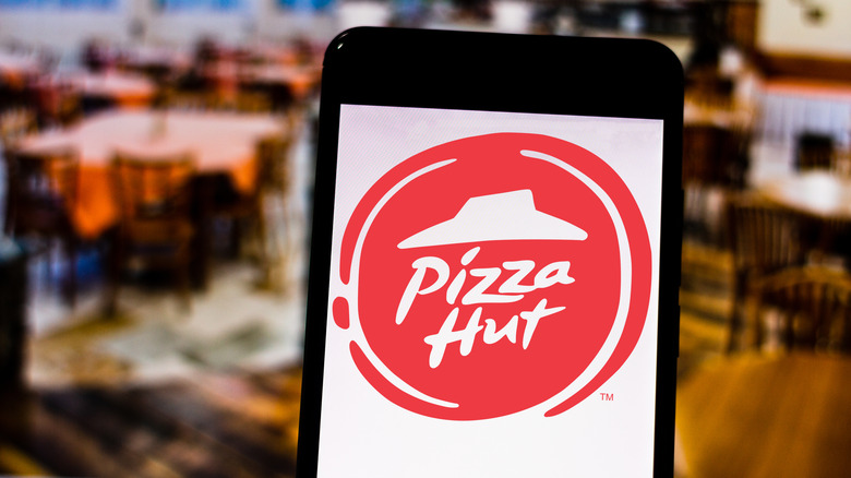 Pizza Hut logo on smartphone screen