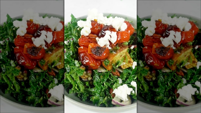 Pizza salad with goat cheese and blistered tomatoes