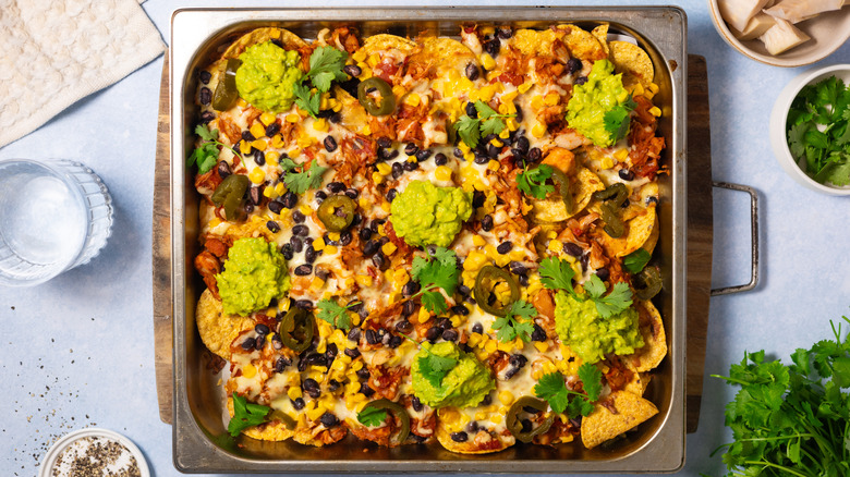 plant-based chipotle jackfruit nachos on tray 