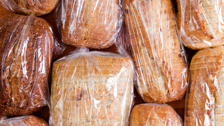 Loaves of bread in plastic bags
