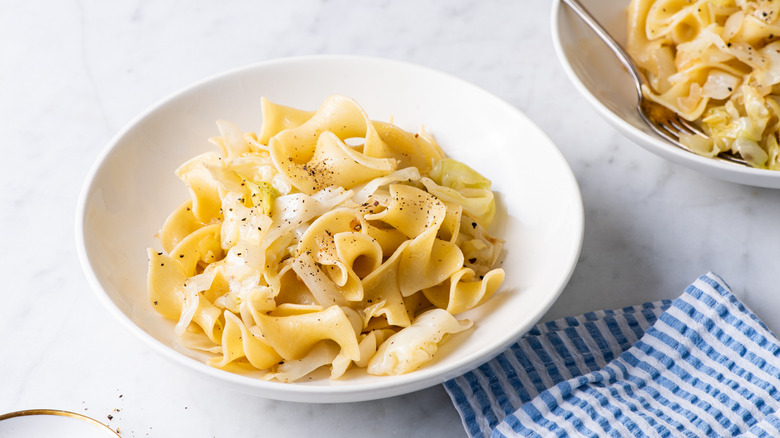 noodles in white bowls