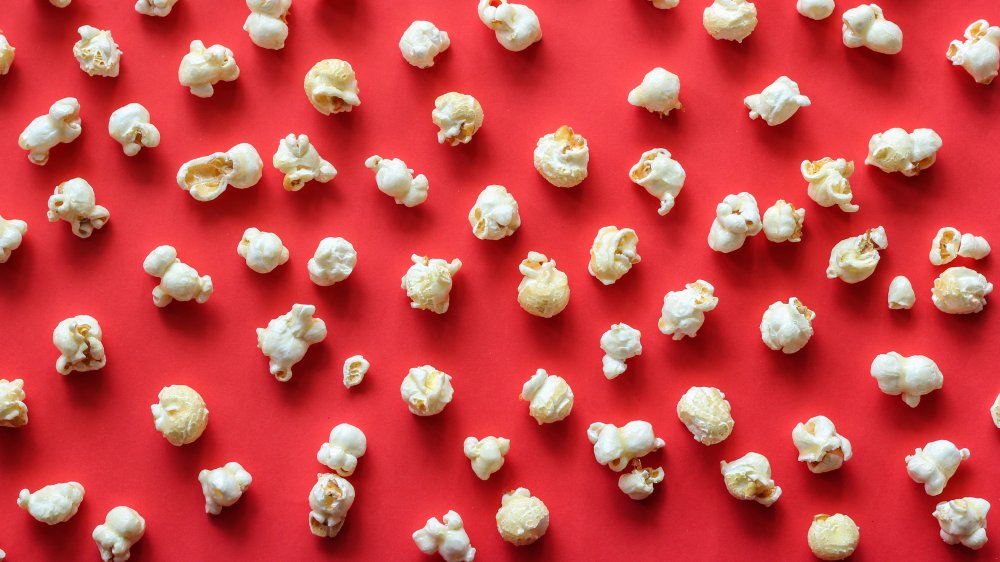 Popcorn against a red background