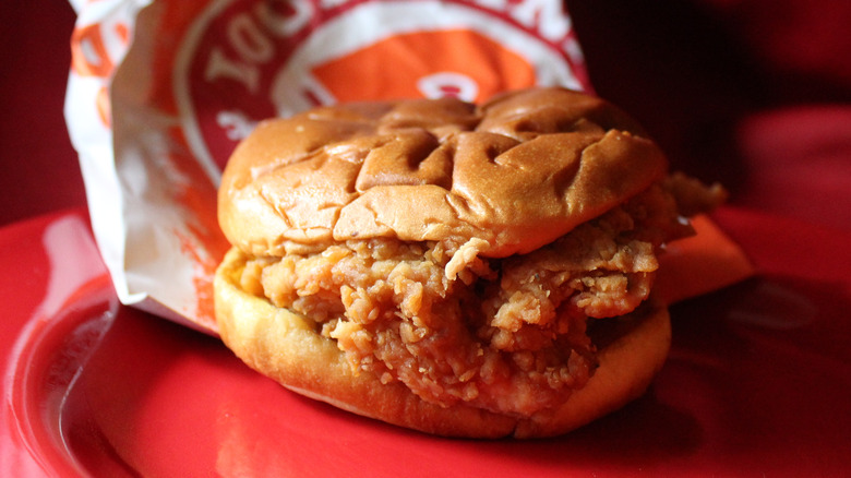 Popeyes chicken sandwich and bag