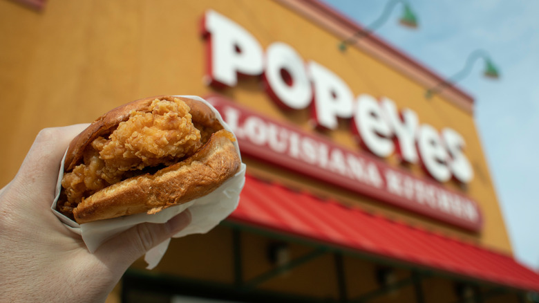 Popeyes storefront with sandwich
