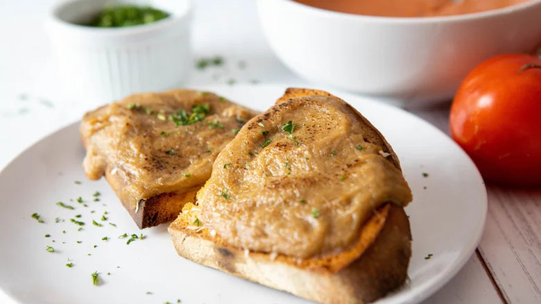 Welsh rarebit sauce covering toasted bread