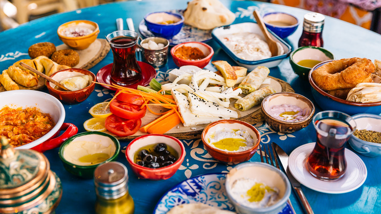 table with traditional Greek food and beverages