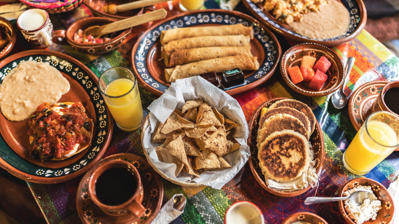 Various Mexican foods on table