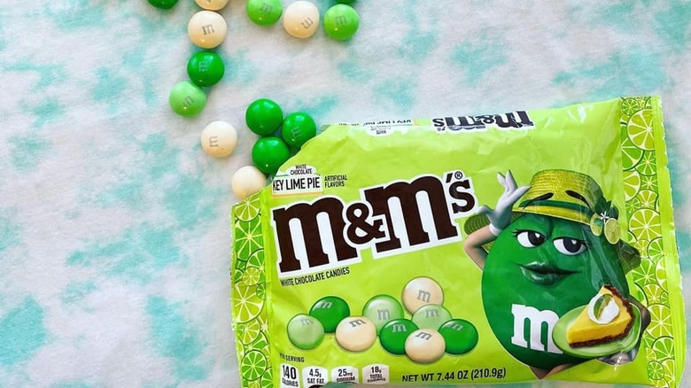 package of Key Lime Pie M&Ms next to green and white M&Ms 