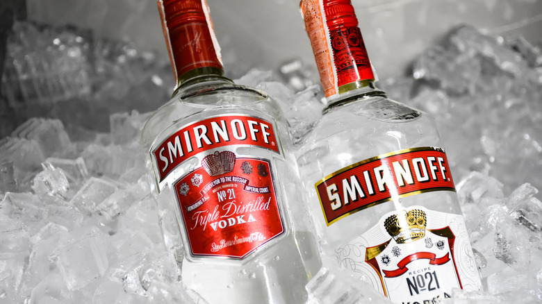 Smirnoff bottles sitting in ice