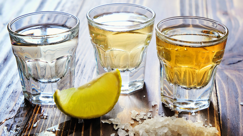 Shots of tequila with salt and lime
