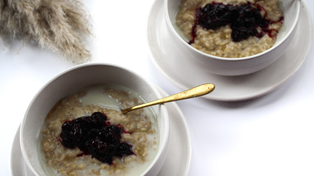 stewed berries on porridge