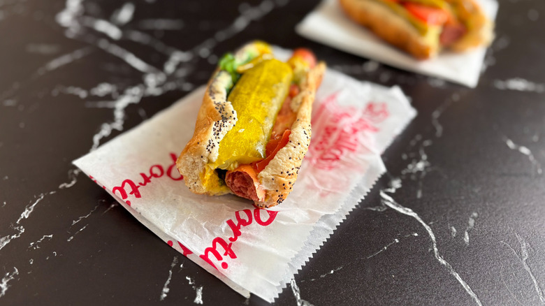 Chicago-style hot dog with bite taken