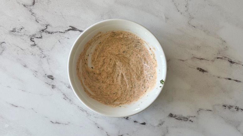 Cajun potato salad dressing in bowl
