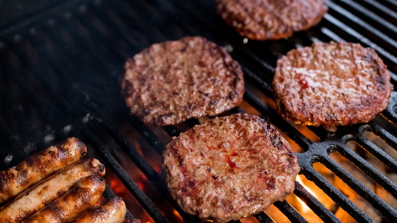 Burgers on hot grill 