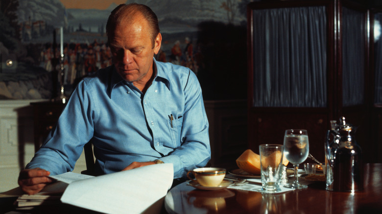 Gerald Ford with bowl and papers