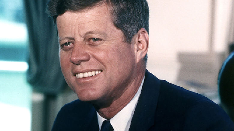 JFK smiling in Oval Office