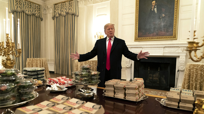 Donald Trump with fast food burgers hosting a dinner at the White House