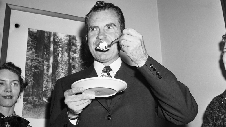 Richard Nixon eating cake