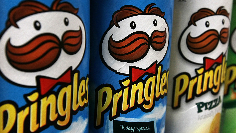 Three Pringles cans