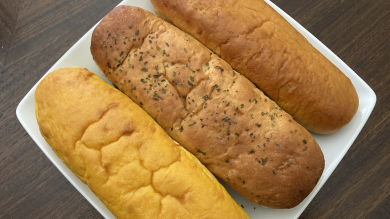 Three Pringles flavored buns on a white plate