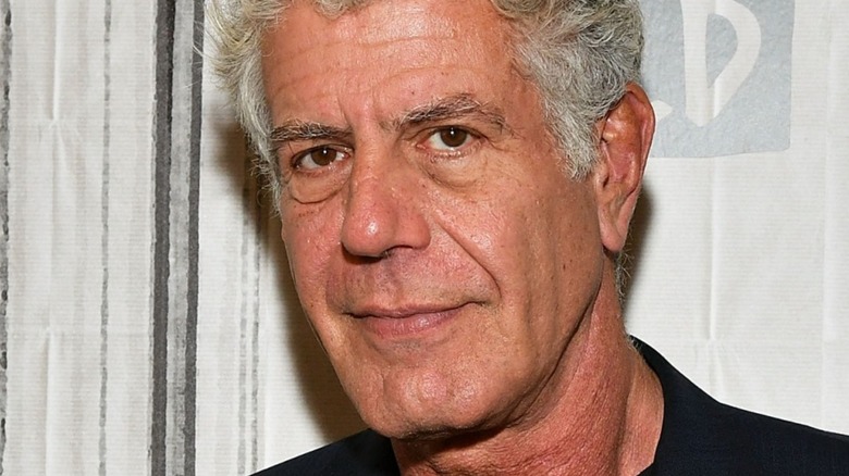 Anthony Bourdain smirking