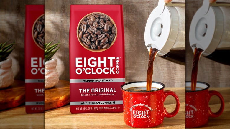 Eight O'Clock Colombian Peaks Coffee from Sam's Club in a photoshoot with a mug of coffee being poured next to the bag of coffee beans