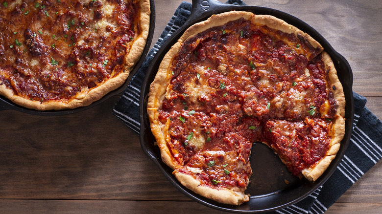 Deep-dish pizza in a cast-iron skillet