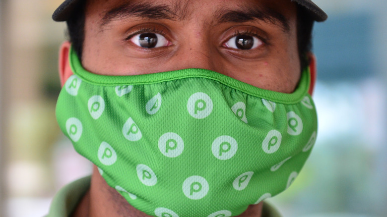 Publix employee in branded mask