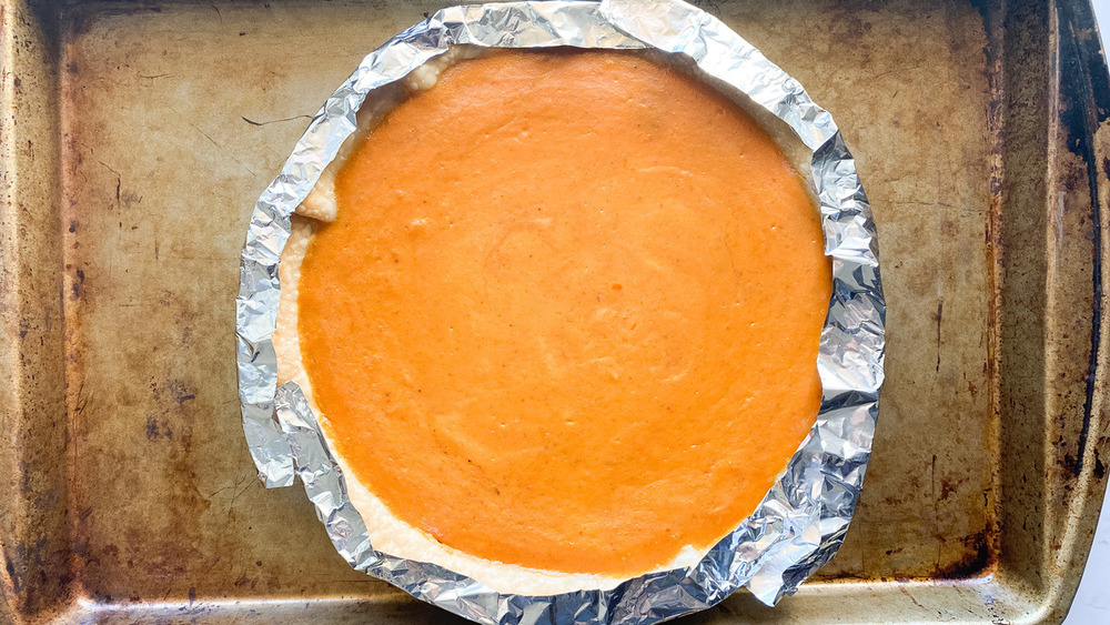 pumpkin pie about to go in the oven