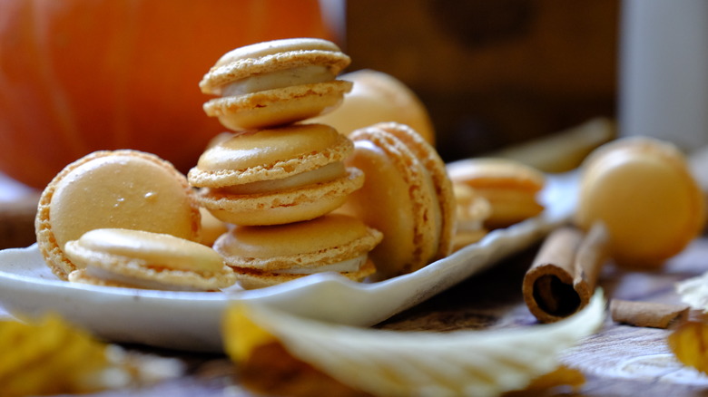plate of pumpkin spice macarons