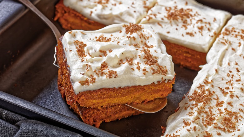 utensil scooping pumpkin spice cake