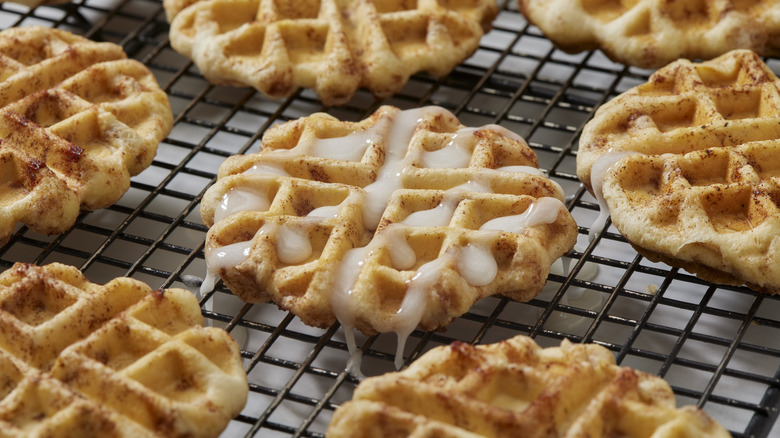 Cinnamon roll waffles on rack