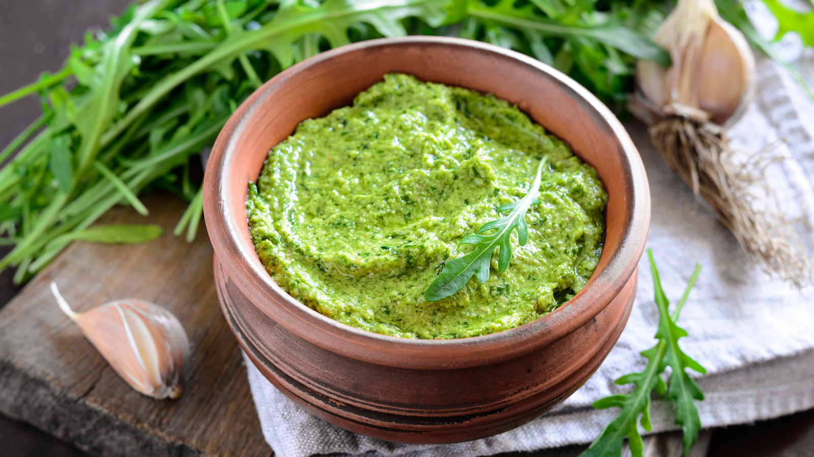 Put Those Wilted Greens To Good Use In Your Next Pesto