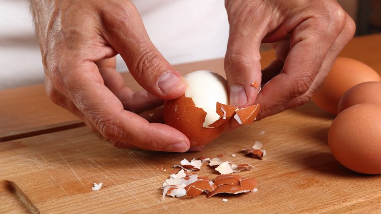peeling a hard-boiled egg