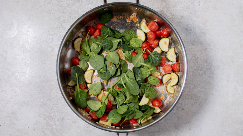 spinach added to the pan