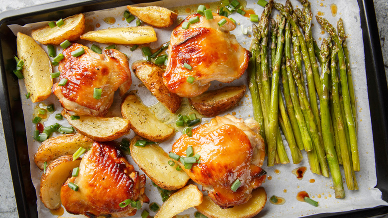 Chicken, asparagus, and potato wedge sheet-pan dinner