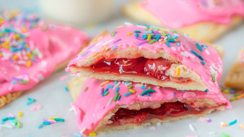 Rainbow copycat PopTarts with pink frosting and rainbow sprinkles