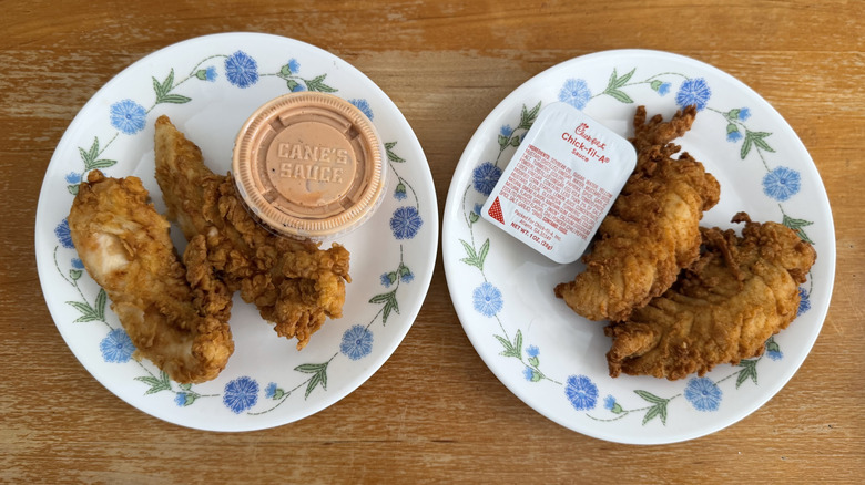 Two tenders and one dipping sauce from each chain on a small plate