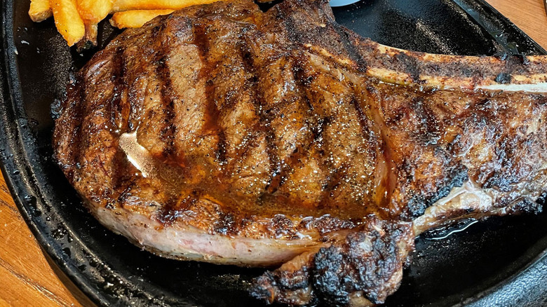 Outback Steakhouse ribeye steak on a plate at the Outback Steakhouse restaurant