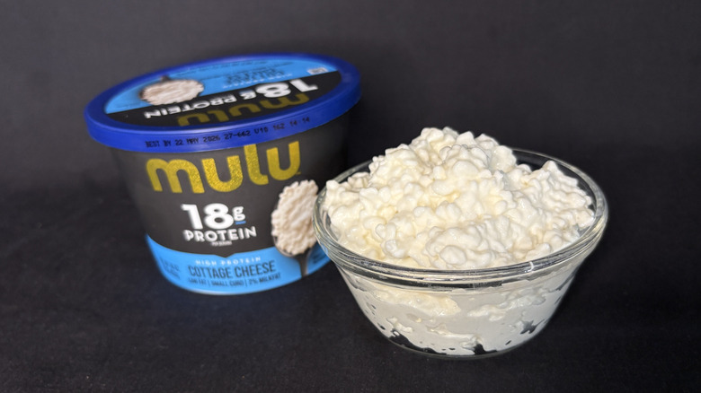 glass dish of cottage cheese with packaging to the left