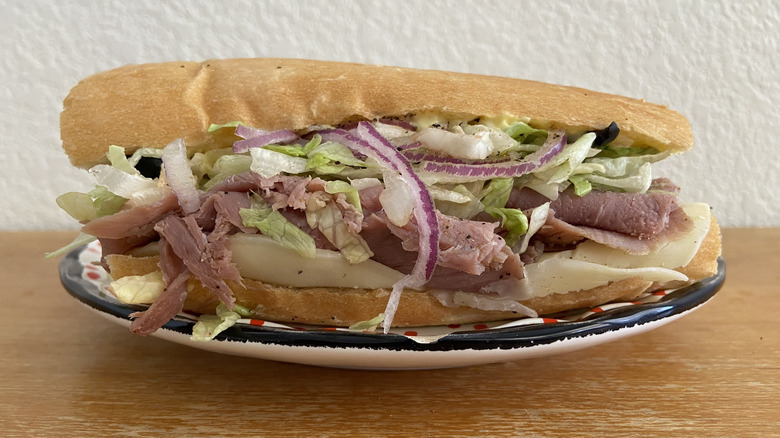 Port of Subs sandwich on a small plate