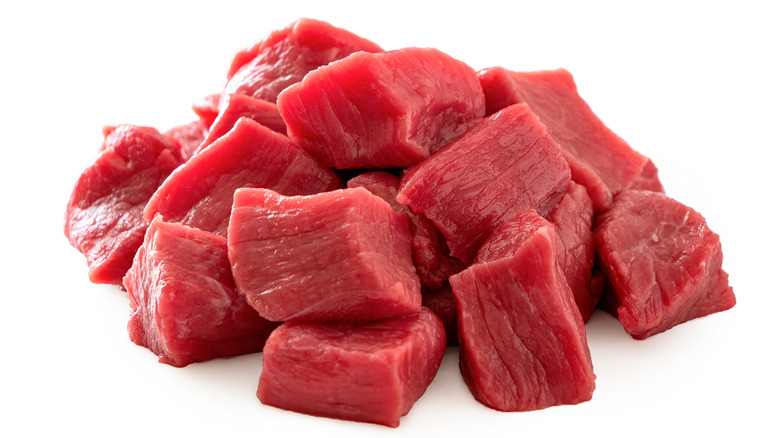Chunks of raw red meat