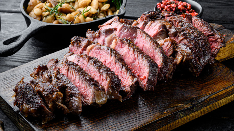 sliced grilled steak with side dish